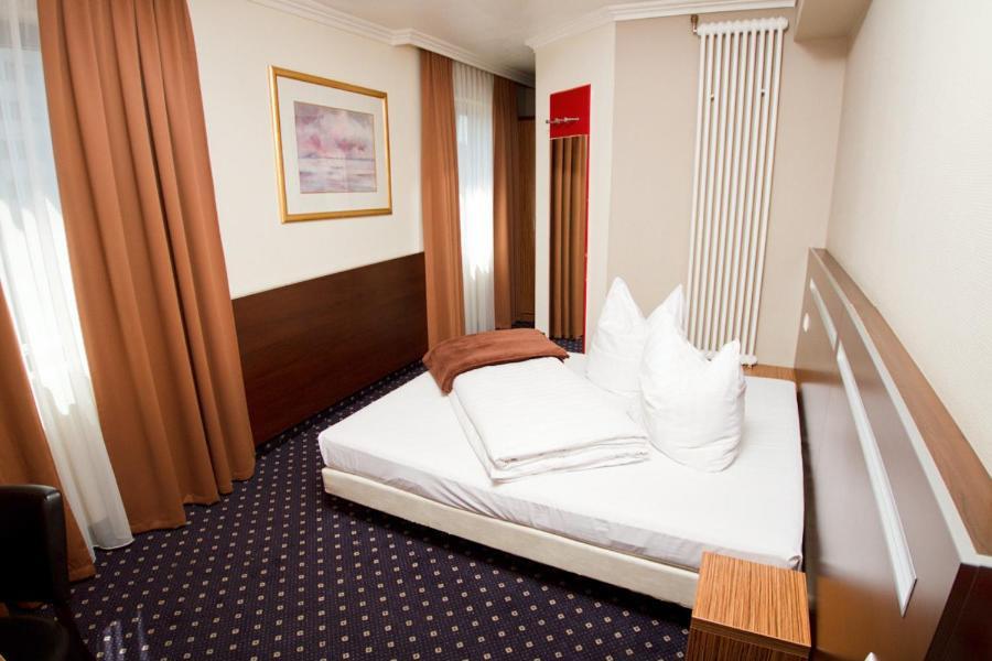Hotel Tourist Fráncfort del Meno Habitación foto